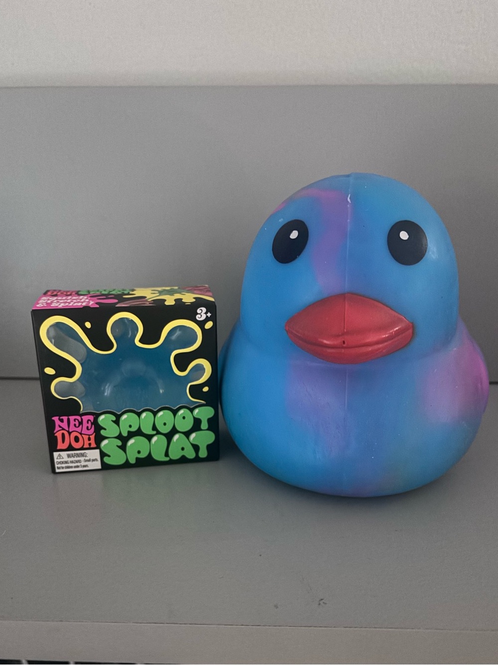Needoh & Squeezy Bundle: Blue Sploot
Splat/Blue Tie-Dye Squeezy Duck